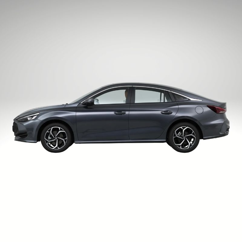 Rear view of the 2026 MG 5 300TGI version on the road, highlighting its sporty exhaust and dynamic design